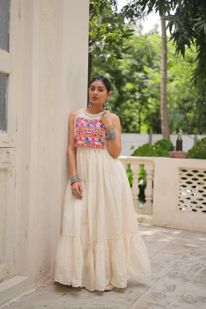Off-White Embroidered Navratri Gown – Kora Cotton, 8M Flair | 2025 Festive Collection