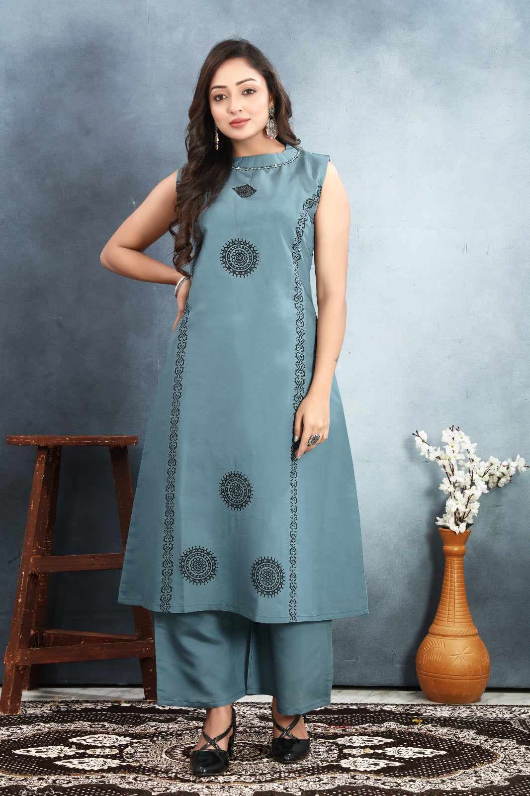Roman Silk Kurti with Block Print and Sequins Work paired with Roman Silk Bottom.