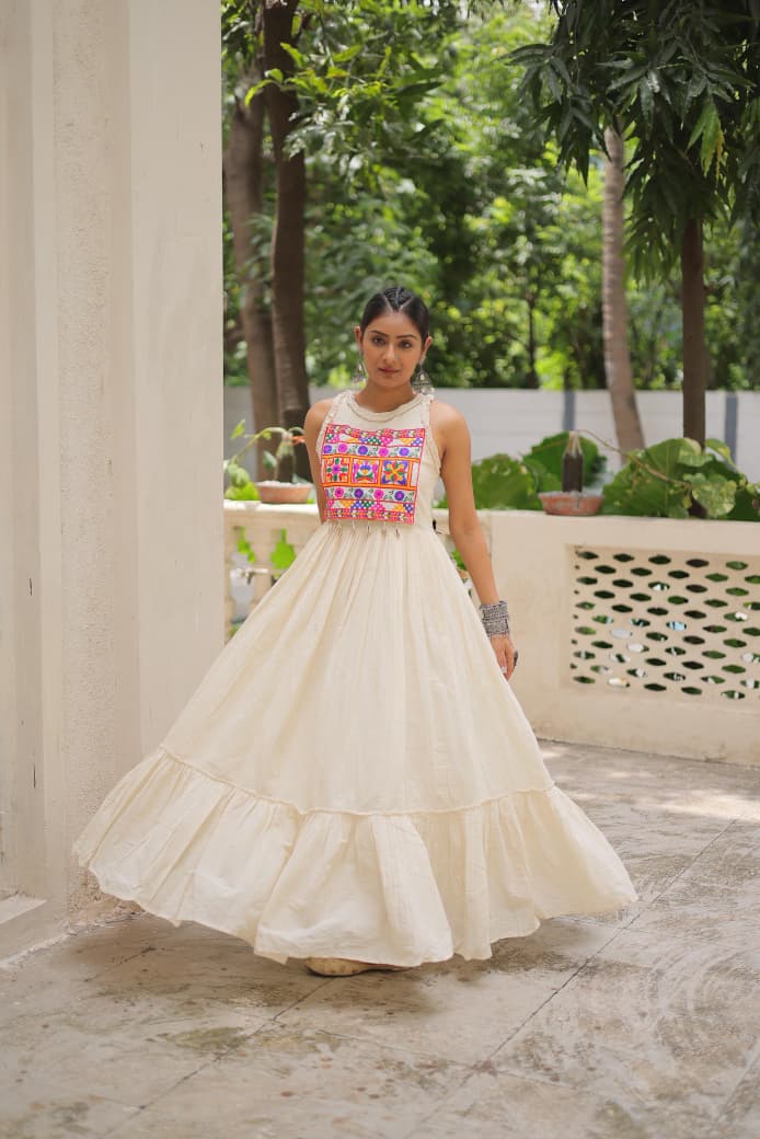 Off-White Embroidered Navratri Gown – Kora Cotton, 8M Flair | 2025 Festive Collection