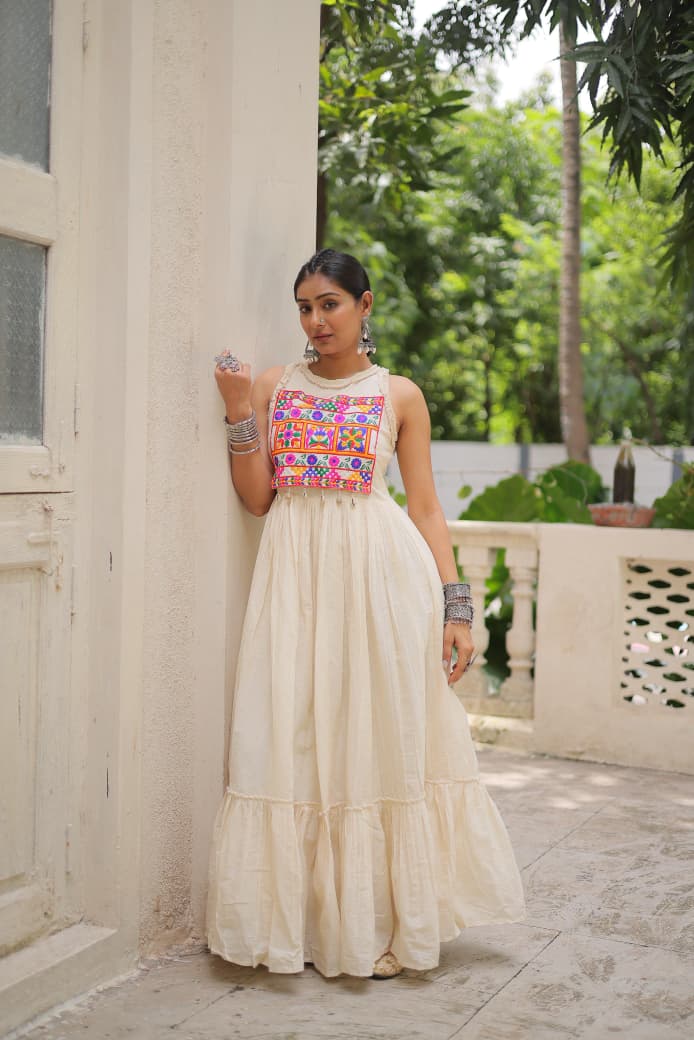 Off-White Embroidered Navratri Gown – Kora Cotton, 8M Flair | 2025 Festive Collection