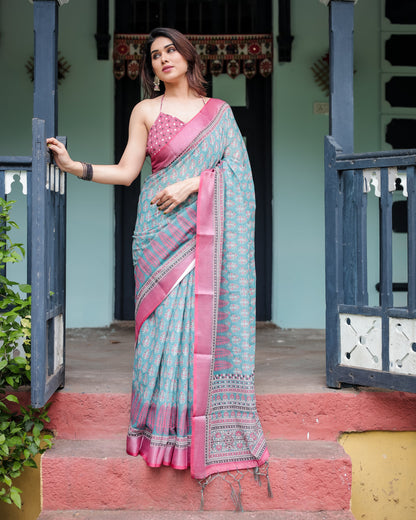 Aqua Blue Pure Cotton Linen Saree with Pink Border, Floral Motifs, and Tassel Detailing