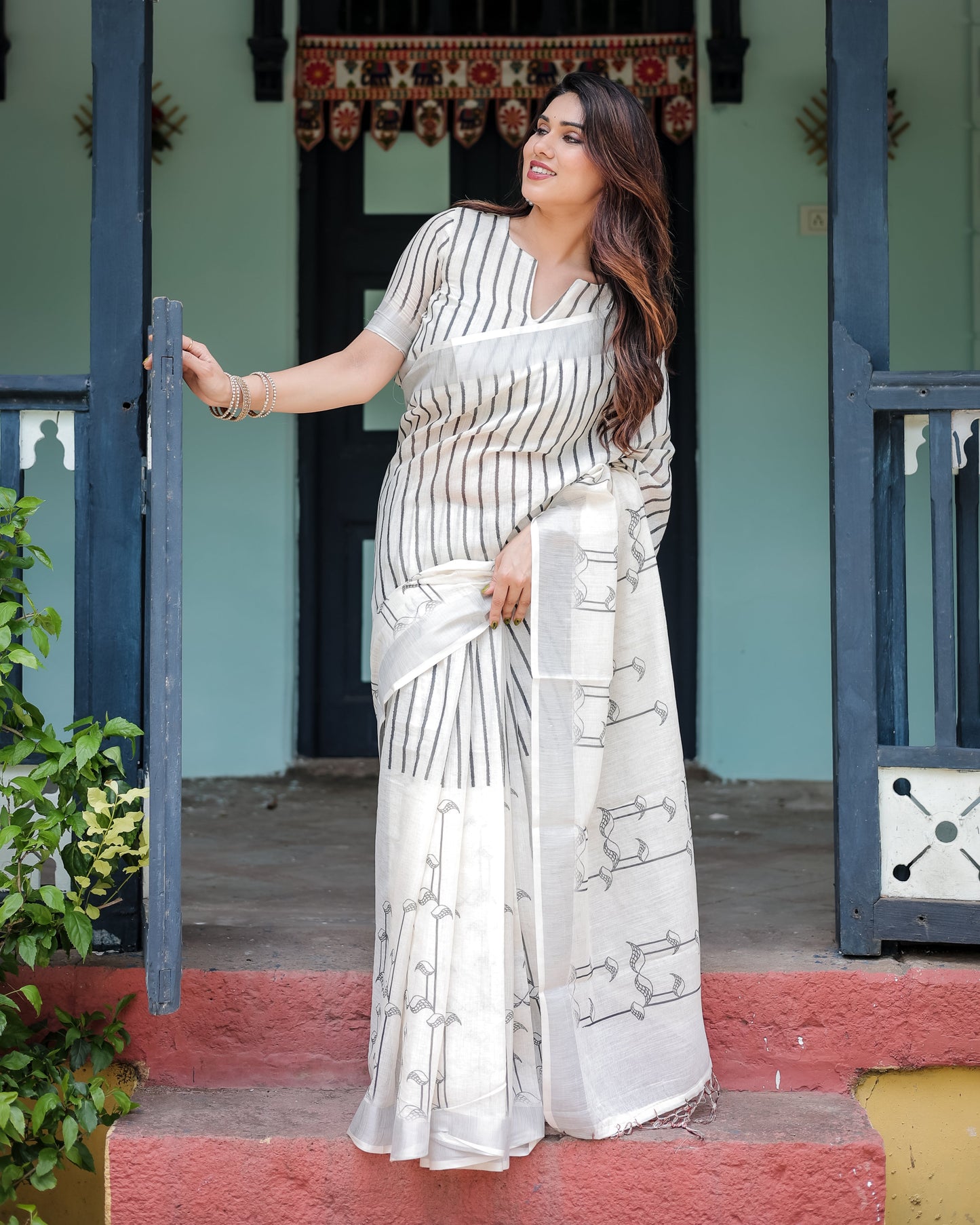 White and Black Pure Cotton Linen Saree with Striped Pattern, Blouse, and Tassel Detailing