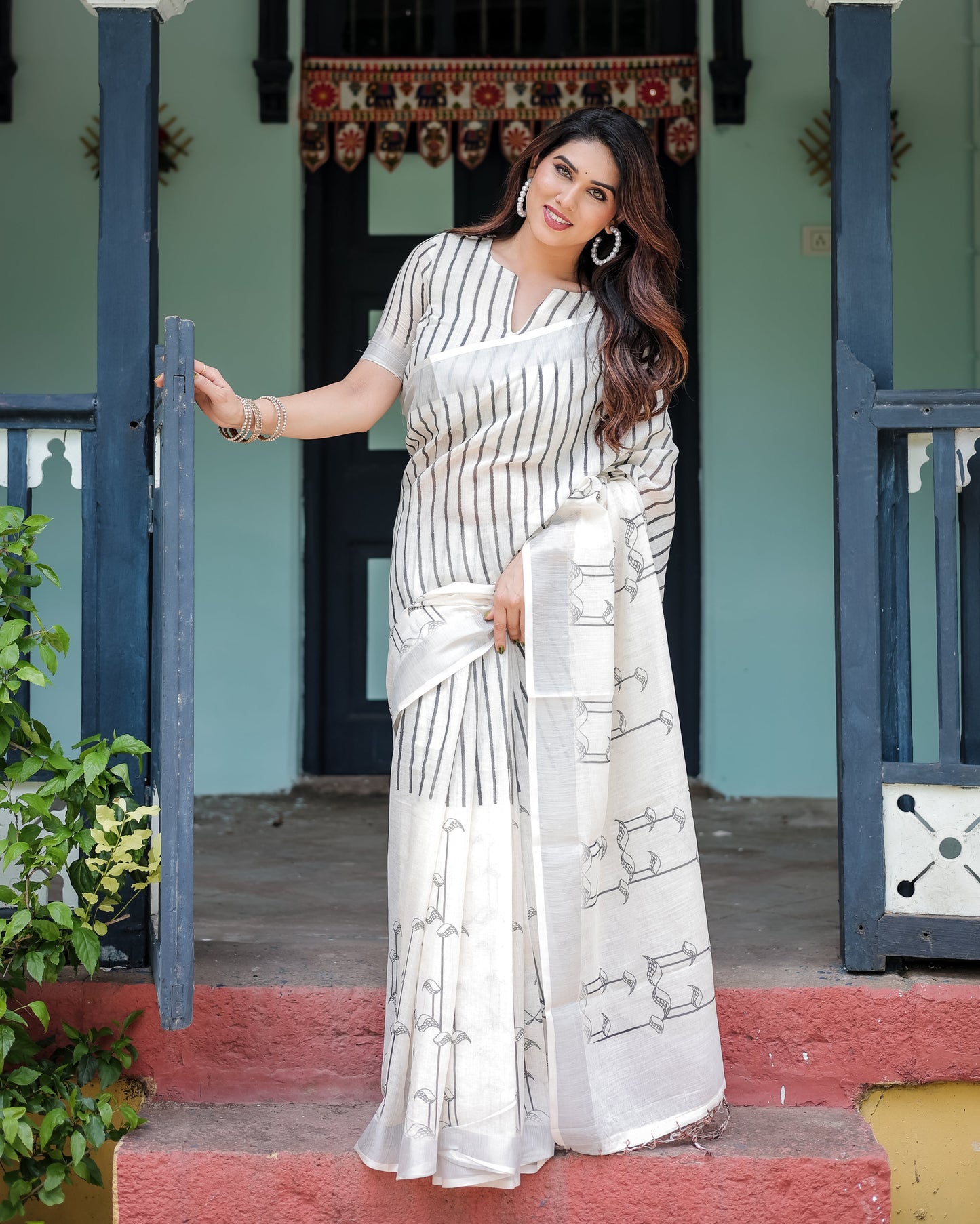 White and Black Pure Cotton Linen Saree with Striped Pattern, Blouse, and Tassel Detailing