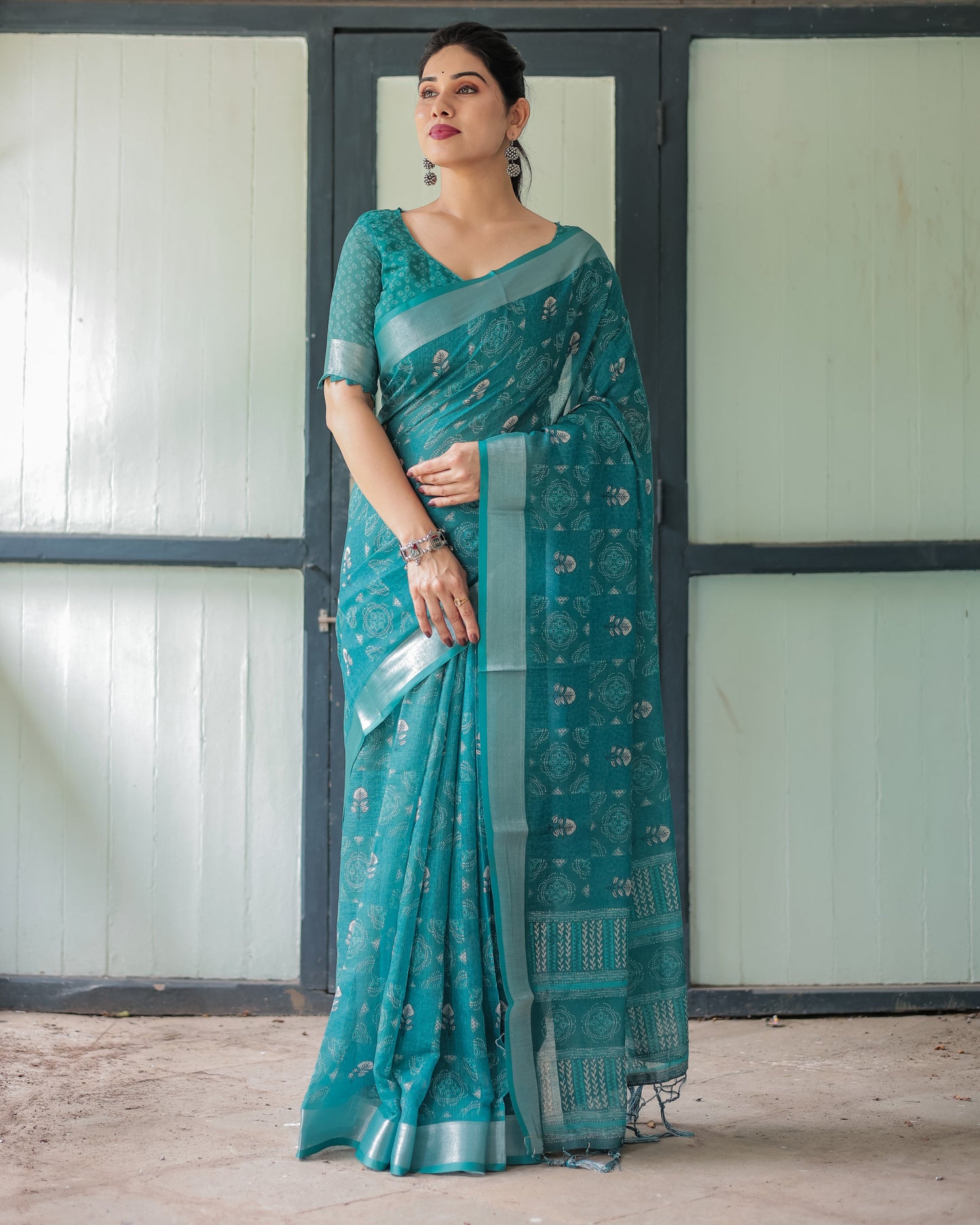 Teal Green Pure Cotton Linen Saree with Silver Floral Motifs and Tassels