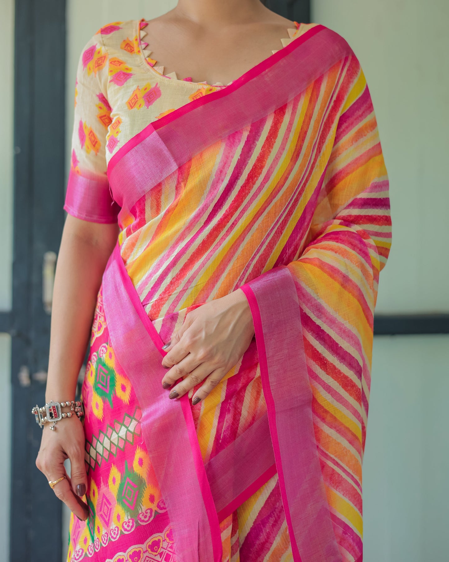 Vibrant Yellow and Pink Ikat Printed Cotton Linen Saree with Blouse and Tassels