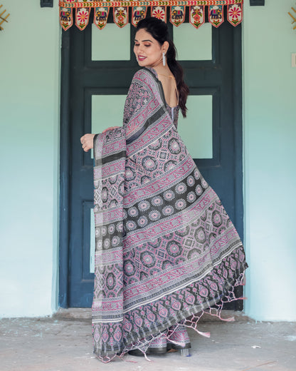 Black Pure Cotton Linen Saree with Pink Striped Pallu and Tassel Accents