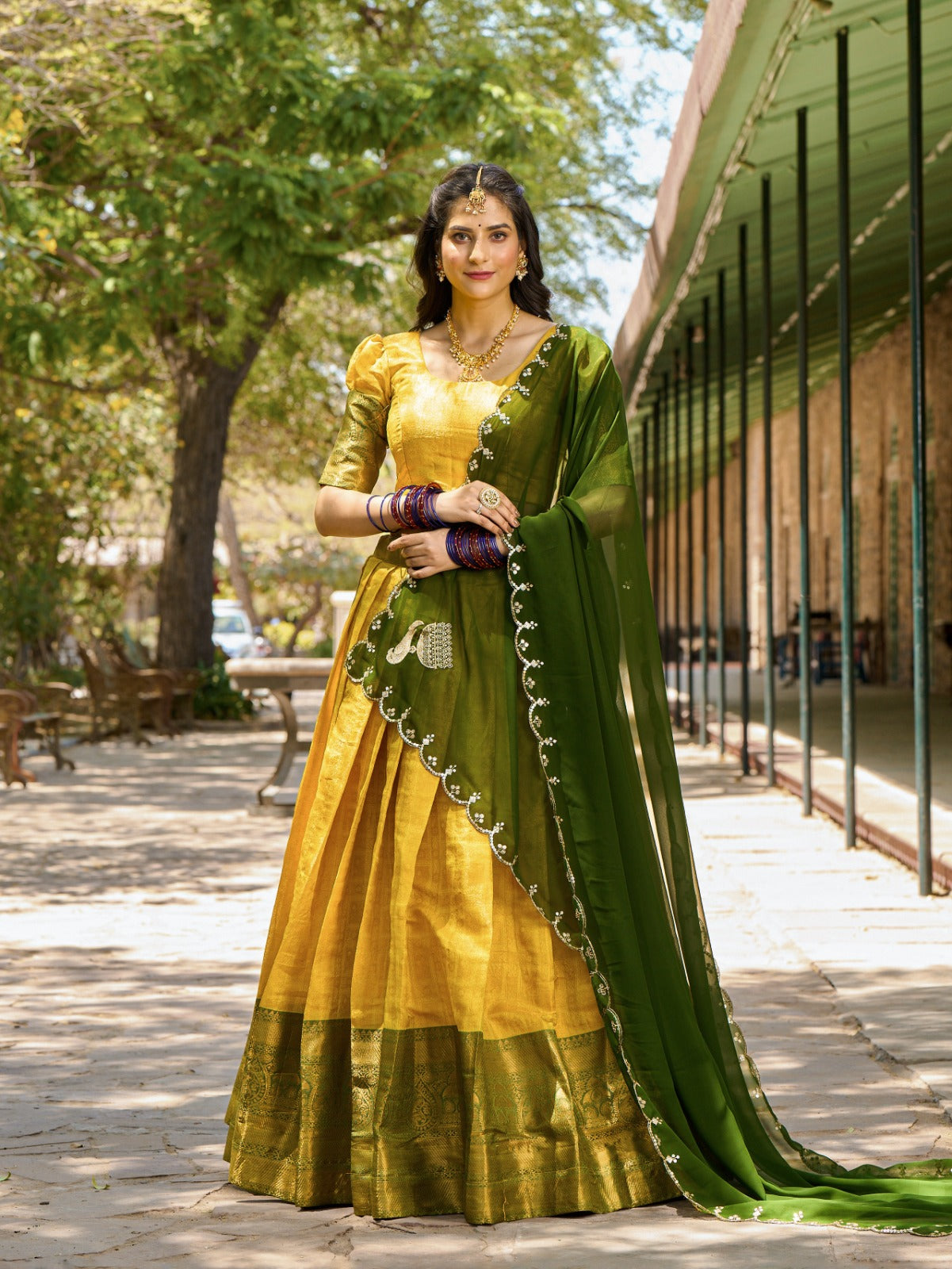 Kanjivaram Silk Lehenga with Zari Weaving Work and Embroidered Dupatta.