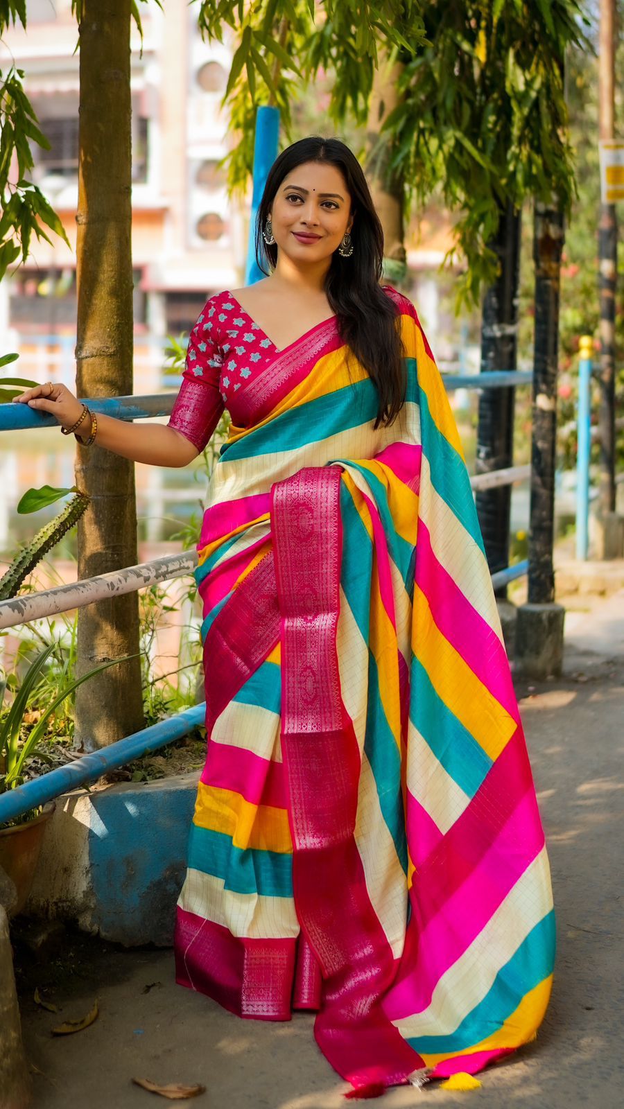 Soft cotton crape chex saree with zari woven border, multi-colored stripes, and running chex blouse with butti print, 6.3 meters in length.