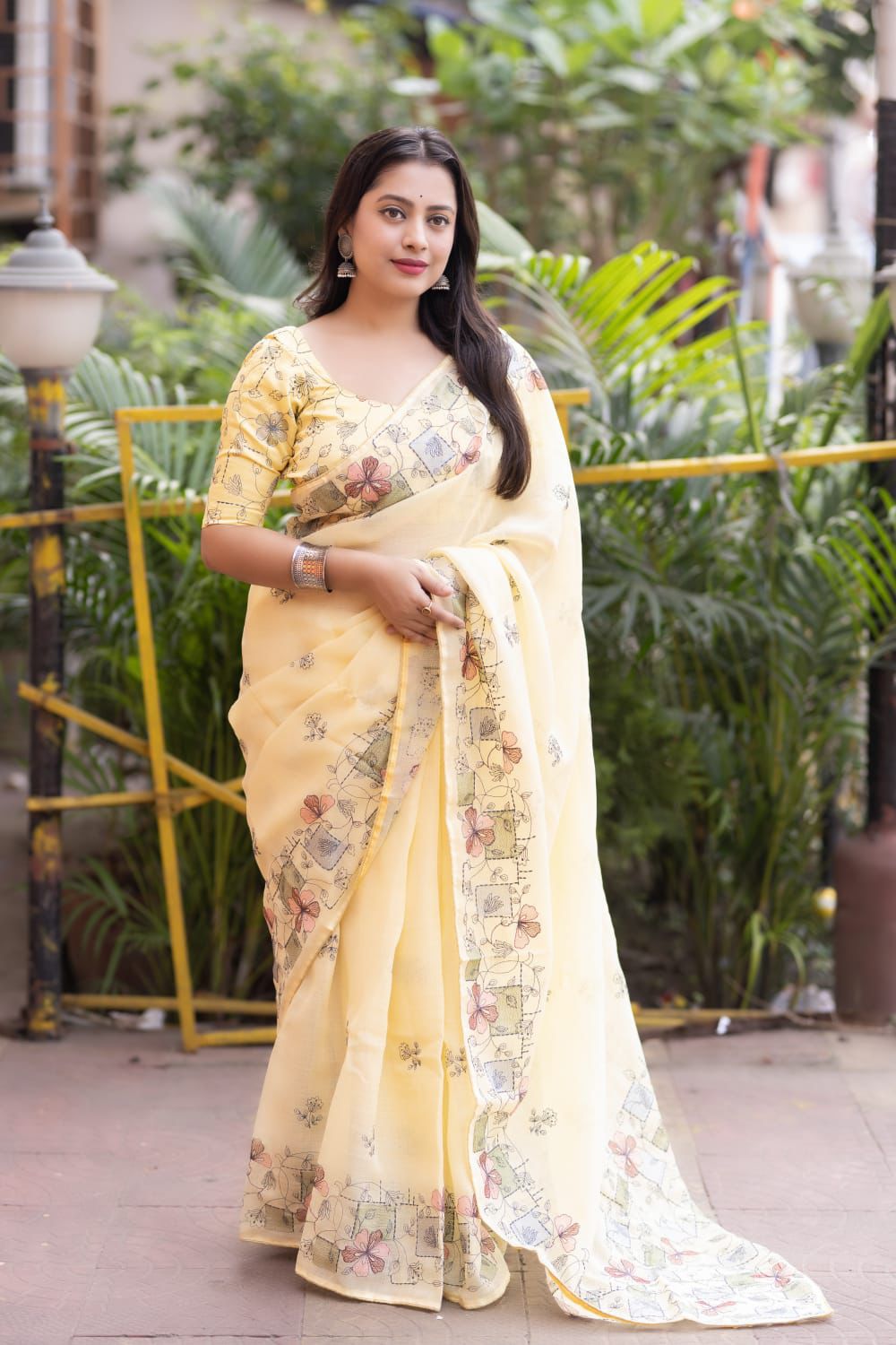 Embroidered phantom silk blouse with matching linen saree