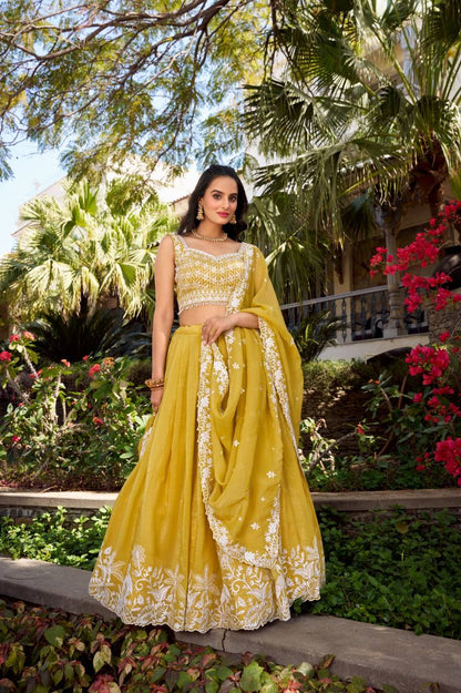 Golden embroidered lehenga set with sequins and lace detailing - Mandira Collection