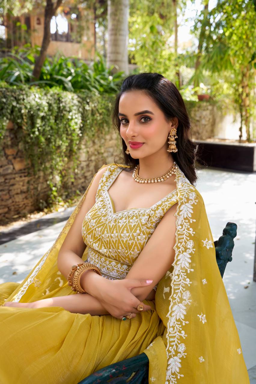 Golden embroidered lehenga set with sequins and lace detailing - Mandira Collection