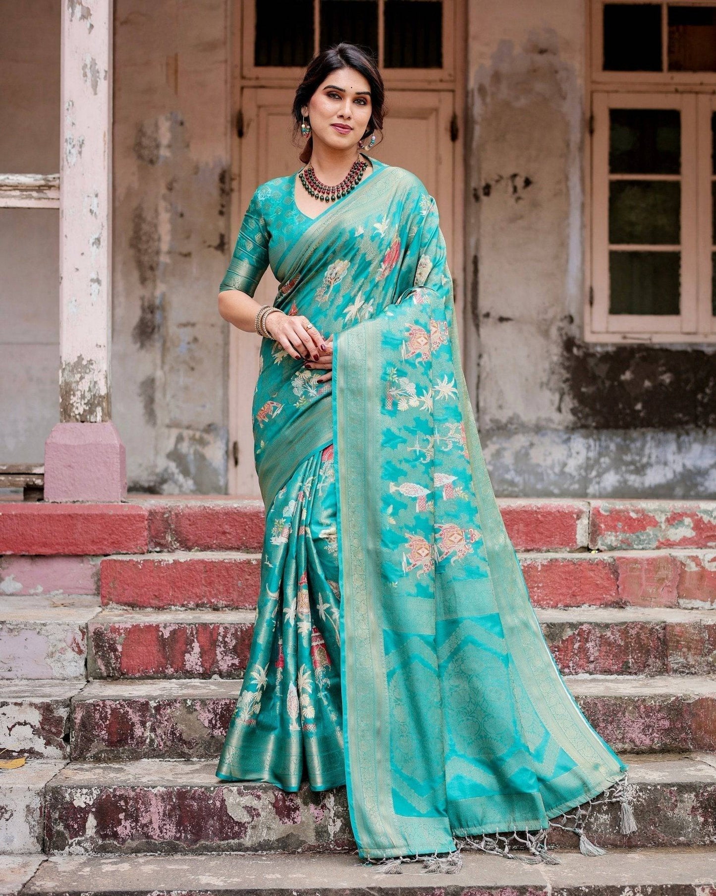 Elegant Teal Green Banarasi Silk Saree with Intricate Zari Weaving and Tassels