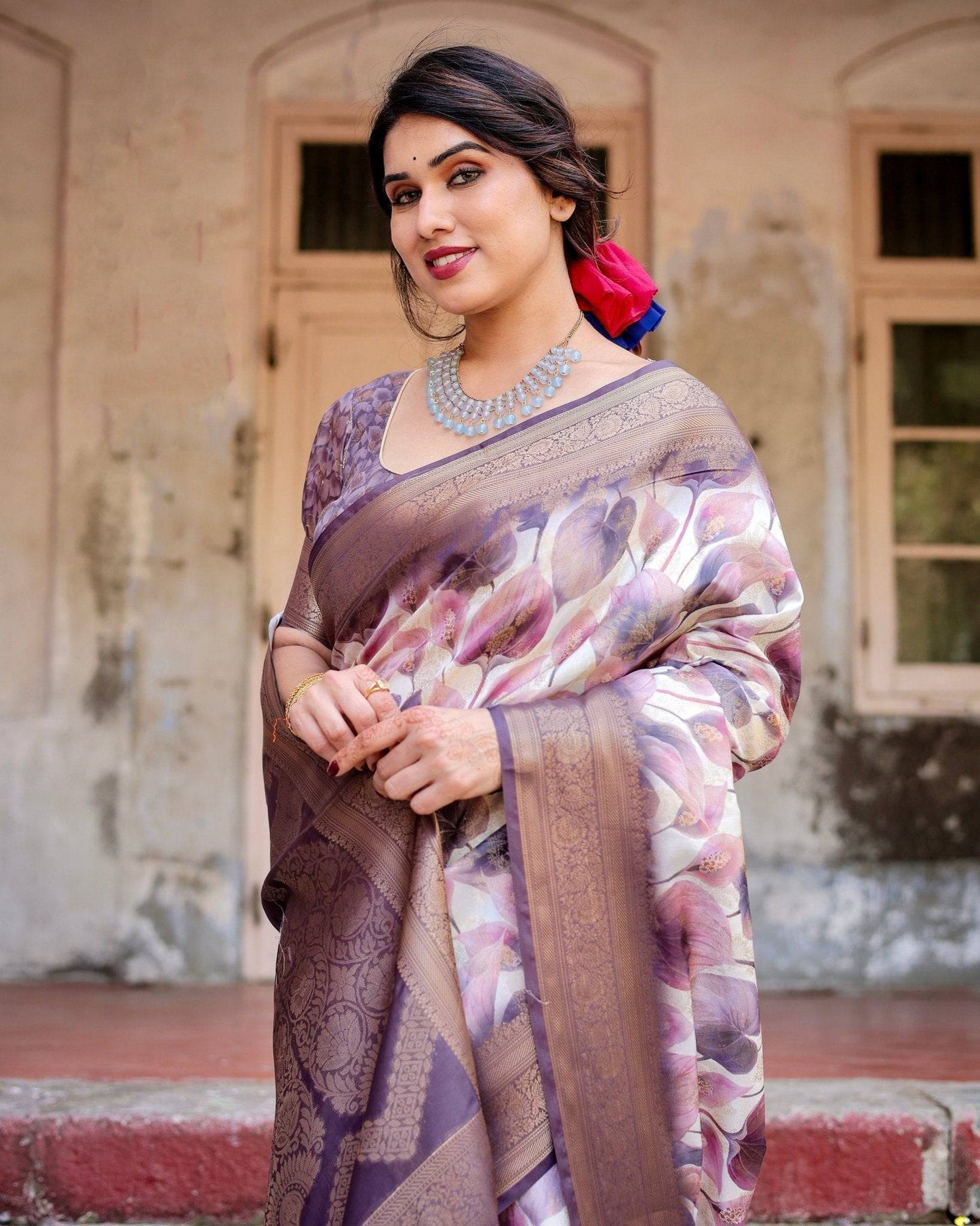 Elegant Purple Floral Banarasi Silk Saree with Intricate Zari Weave and Tassels