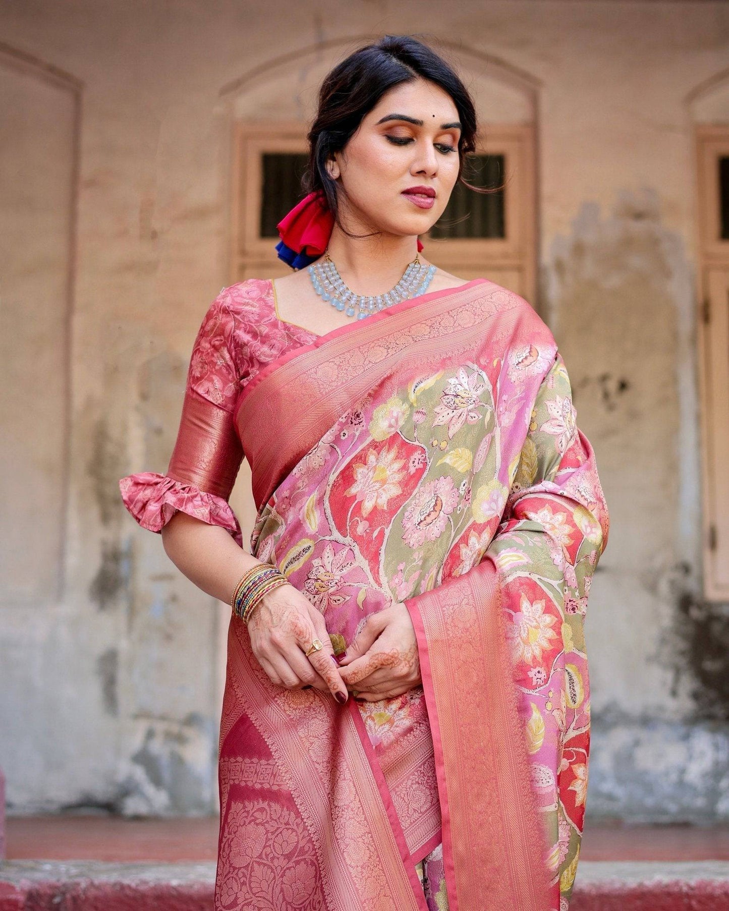 Graceful Peach and Pink Banarasi Silk Saree with Zari Weave and Tassels