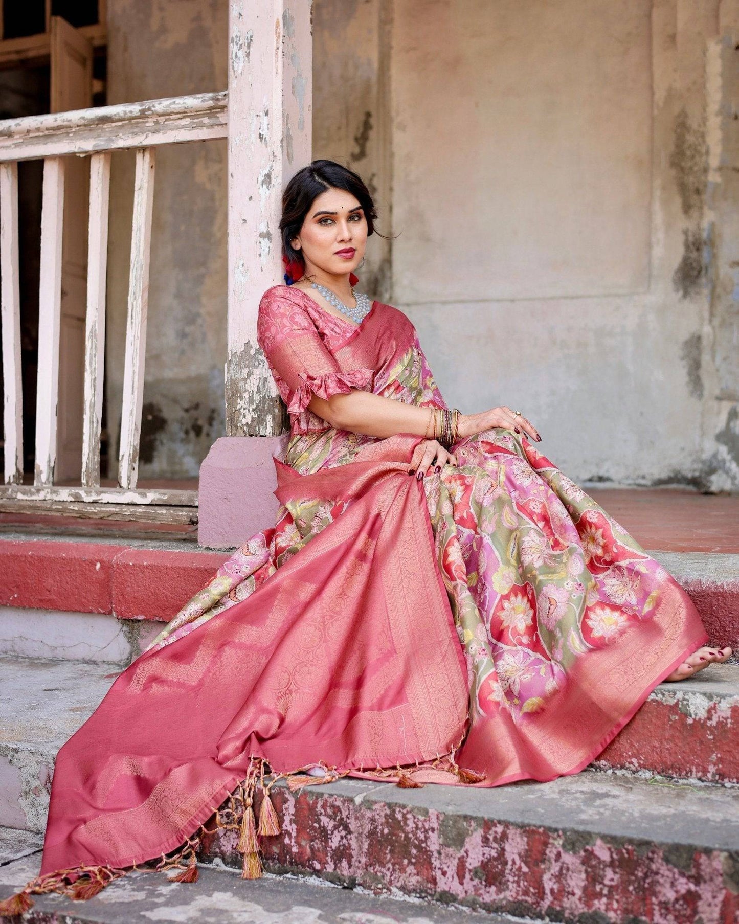 Graceful Peach and Pink Banarasi Silk Saree with Zari Weave and Tassels