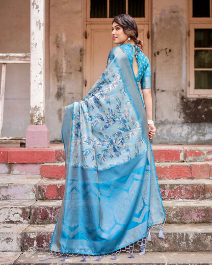 Aqua Blue Banarasi Silk Saree with Zari Border, Floral Motifs, and Tassels