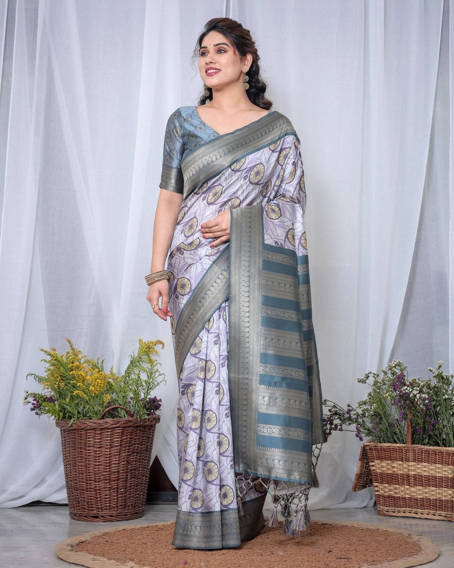 Graceful Banarasi Digitally Printed Silk Saree in Silver and Teal with Zari Work and Tassels