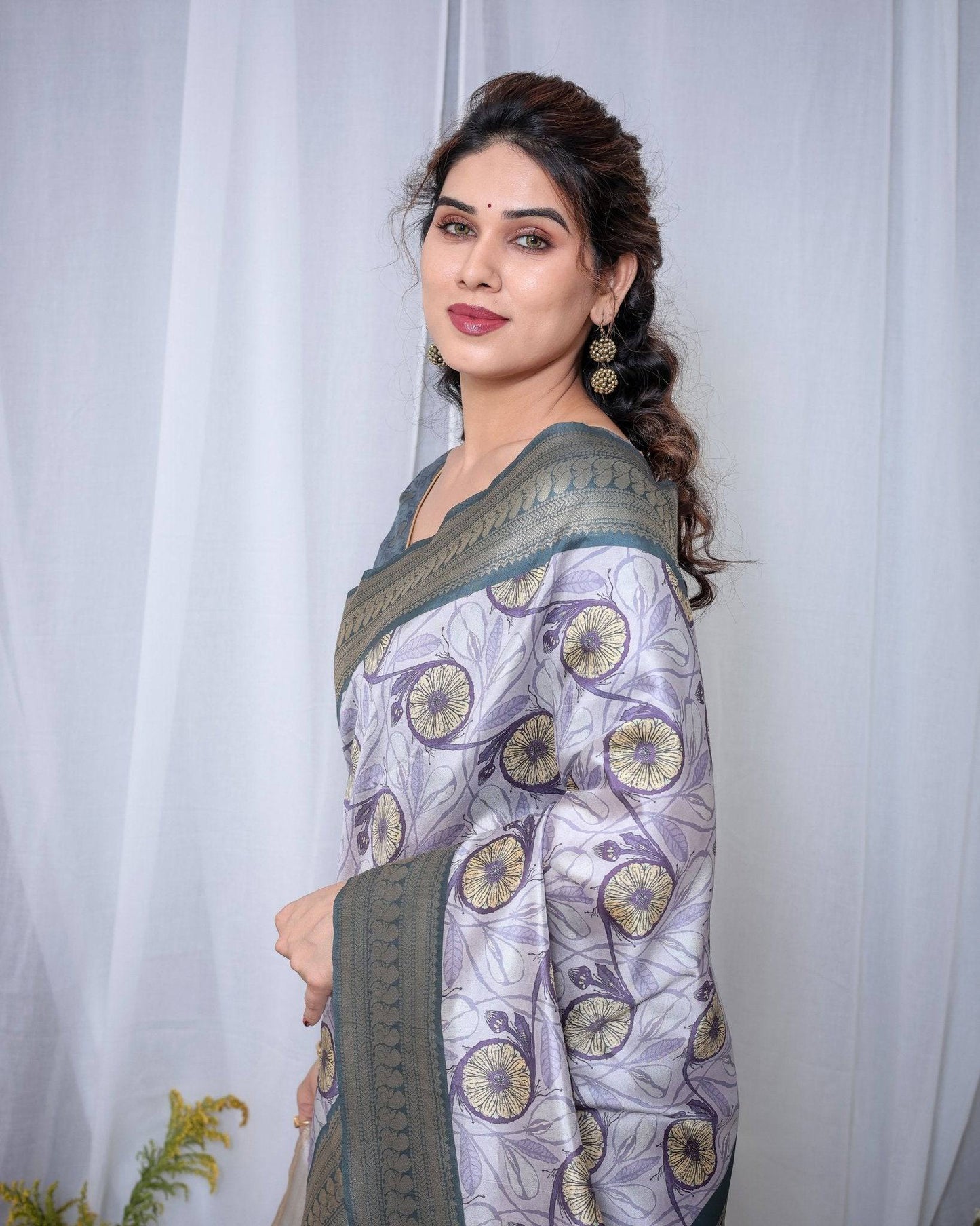 Graceful Banarasi Digitally Printed Silk Saree in Silver and Teal with Zari Work and Tassels